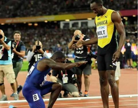 Justin Gatlin shows his respect to Usain Bolt after beating him